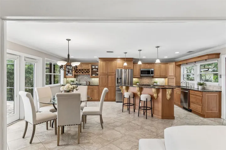 Light filled dining area has lake views.