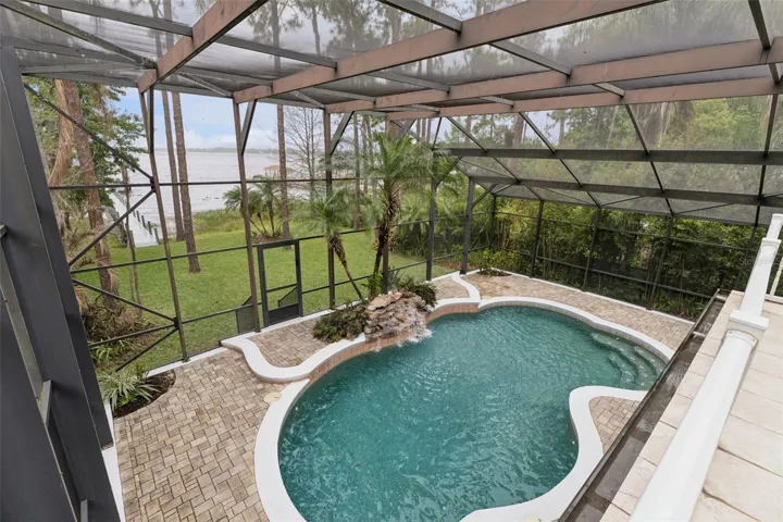 Balcony, lanai and a screened pool.