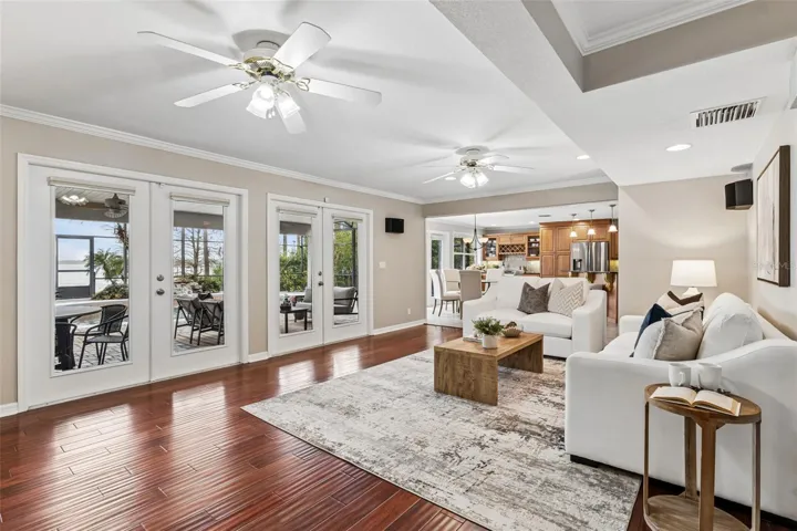 French doors off the living area open to the lanai and pool.