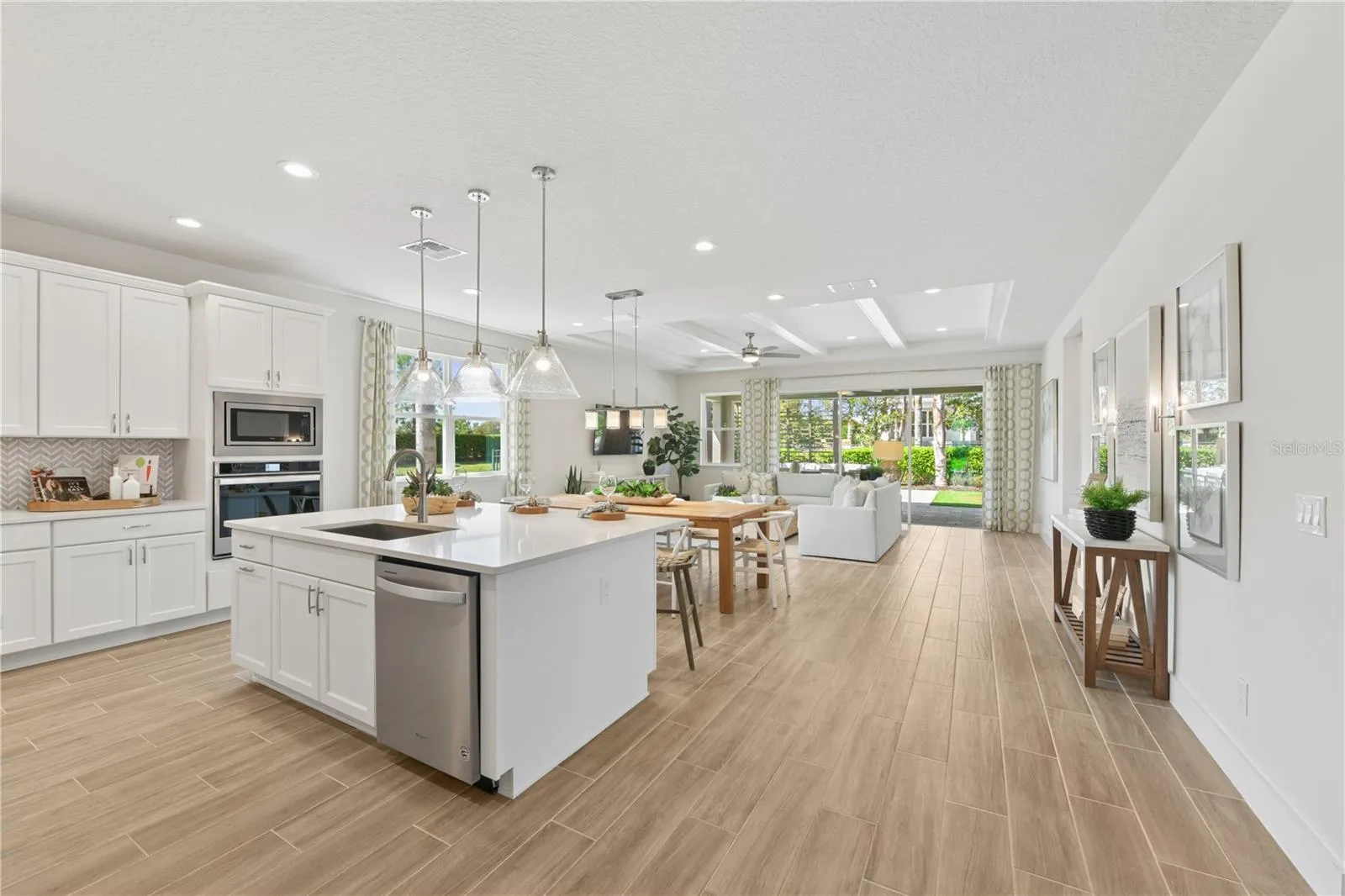 Open-concept living and dining with abundant light, breezy flow, and a calm, inviting ambiance.