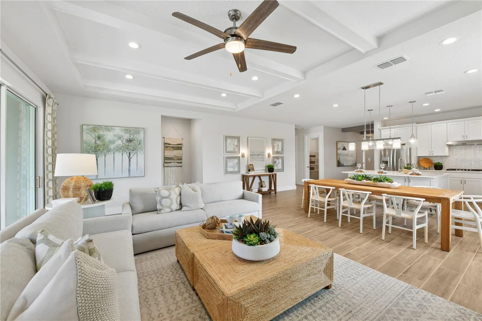 Open-concept living and dining with abundant light, breezy flow, and a calm, inviting ambiance.