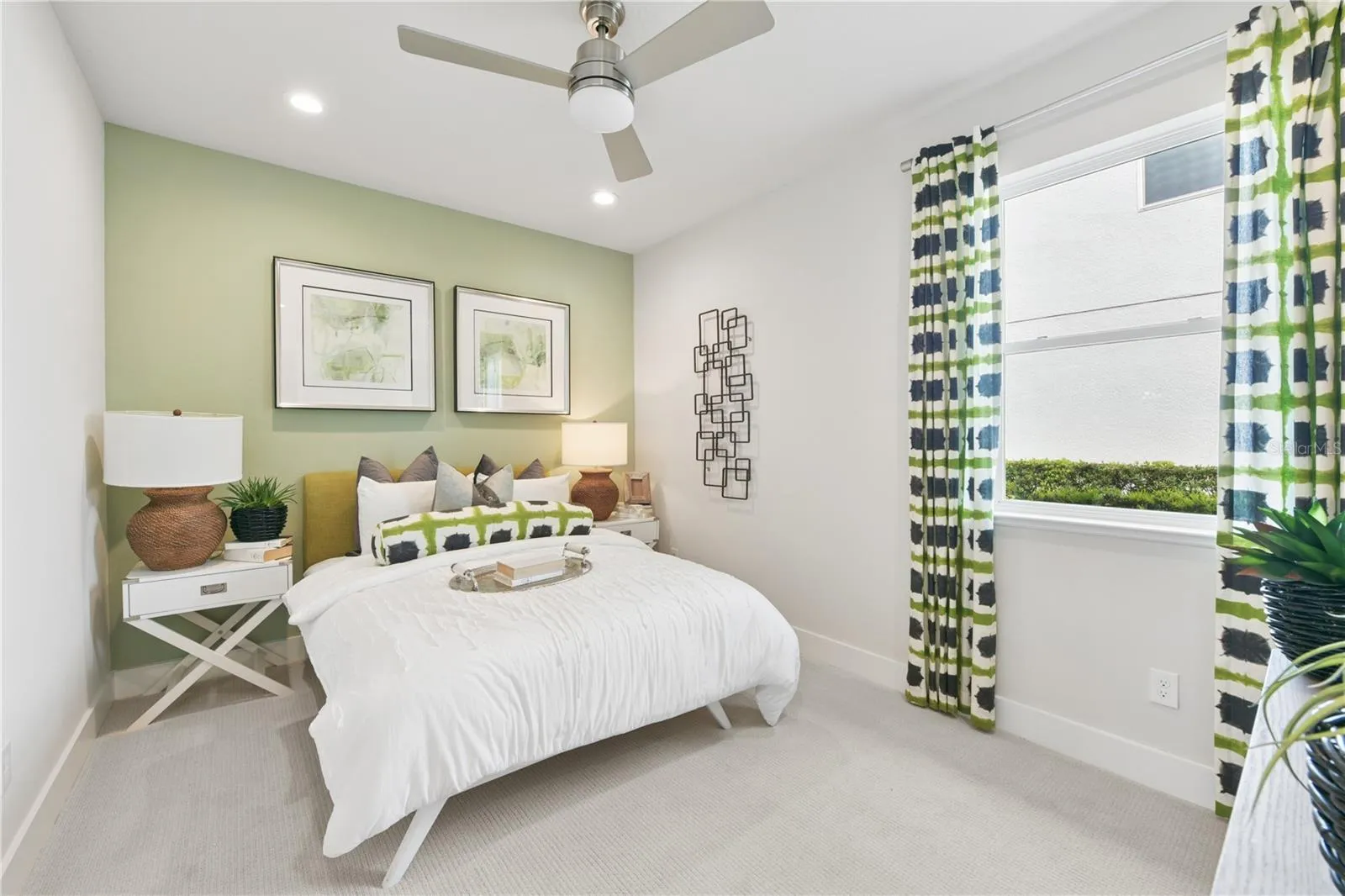 Private ensuite retreat with a spacious walk-in closet and a sleek walk-in shower in soothing finishes.