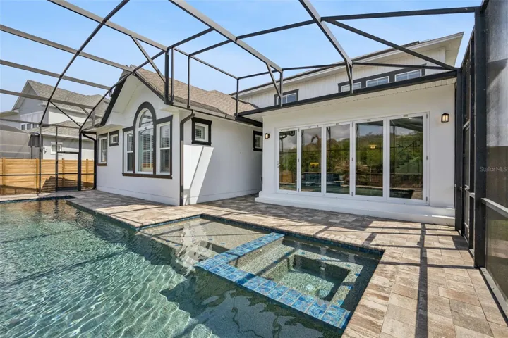Pool with Spa and Water Features