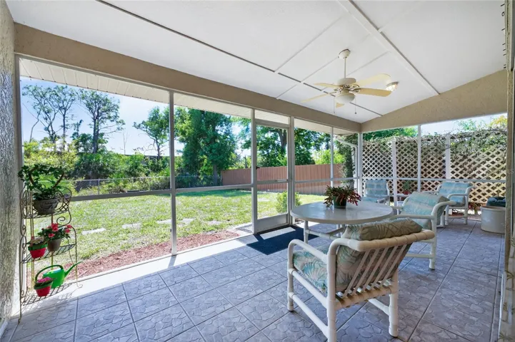 Nicely sized lanai has tiled flooring