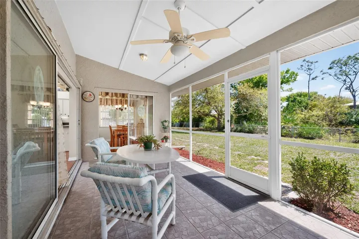 Sit on the lanai and gaze over your private fenced back yard!