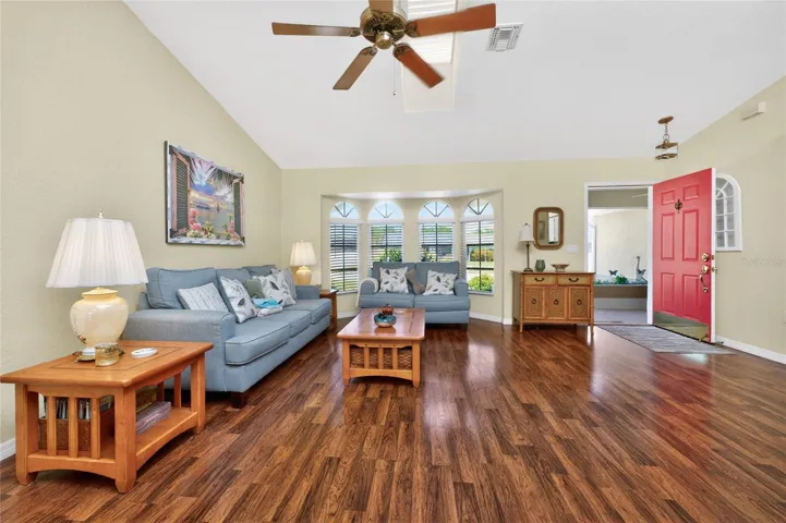 Living area has updated laminate flooring.