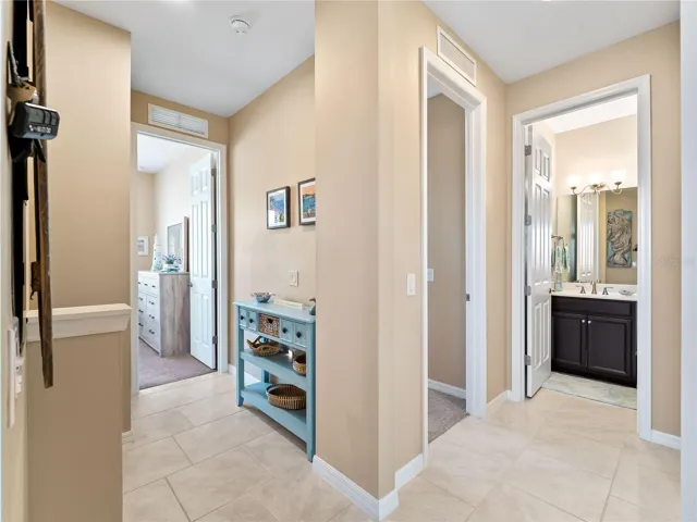 Hallway that leads to your guest bath, bedrooms 2 & 3 and your laundry