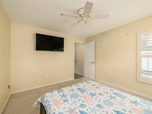 Bedroom #2 across from pool bath