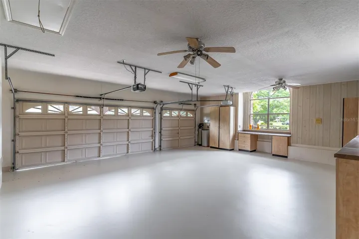 Immaculate 3-Car Garage with Workbench Space