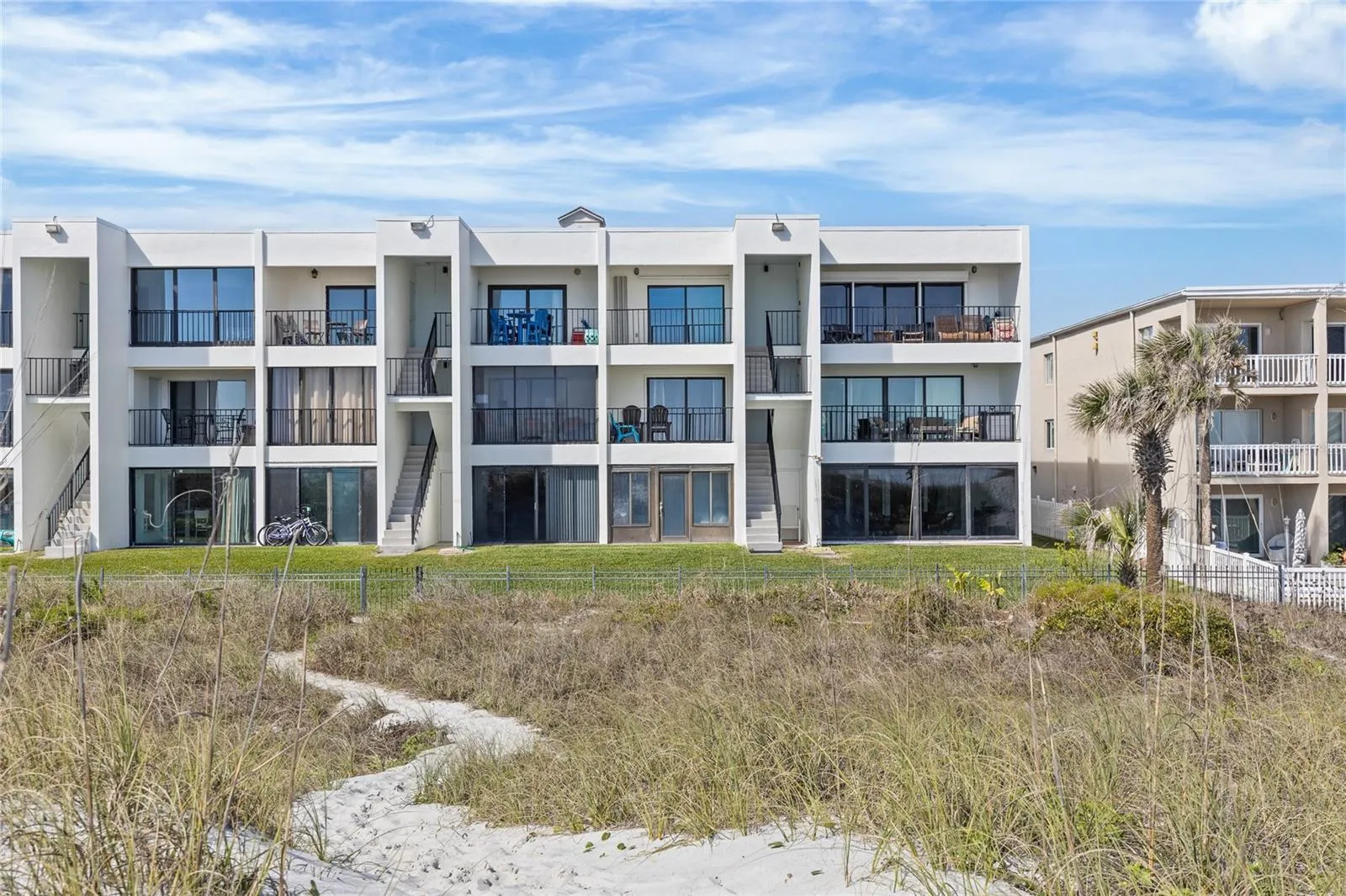Direct beach access allows for effortless coastal living--morning walks on the sand, ocean sunrises, and year-round enjoyment.