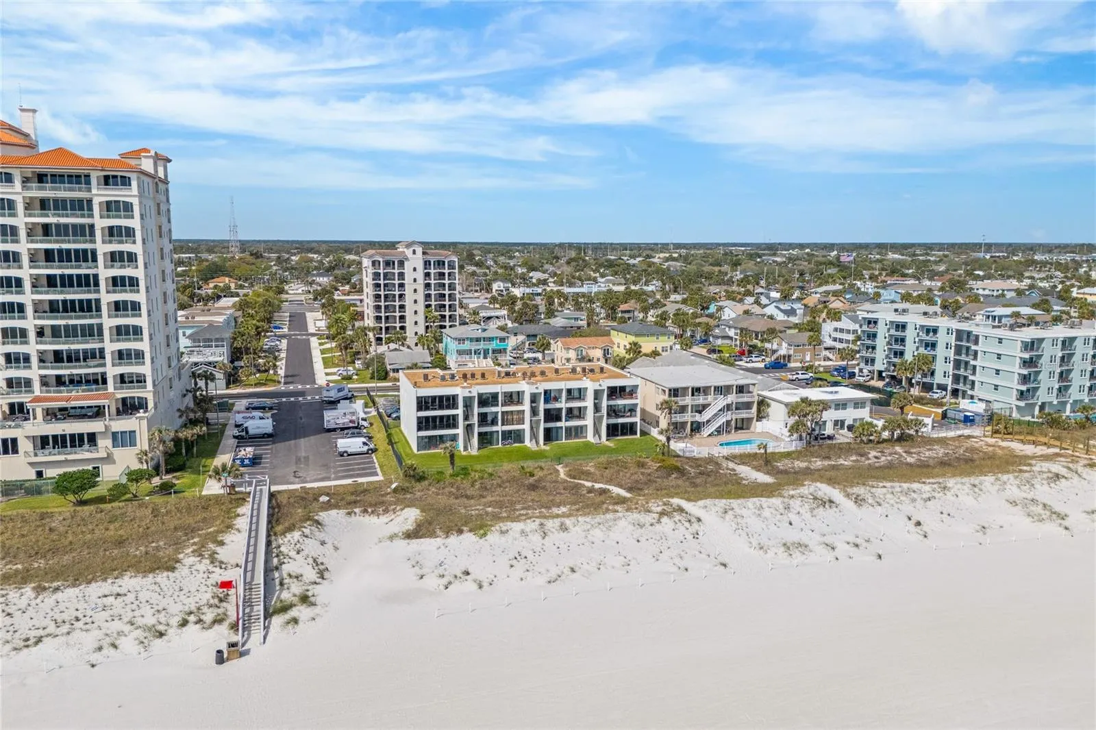 Direct beach access allows for effortless coastal living--morning walks on the sand, ocean sunrises, and year-round enjoyment.