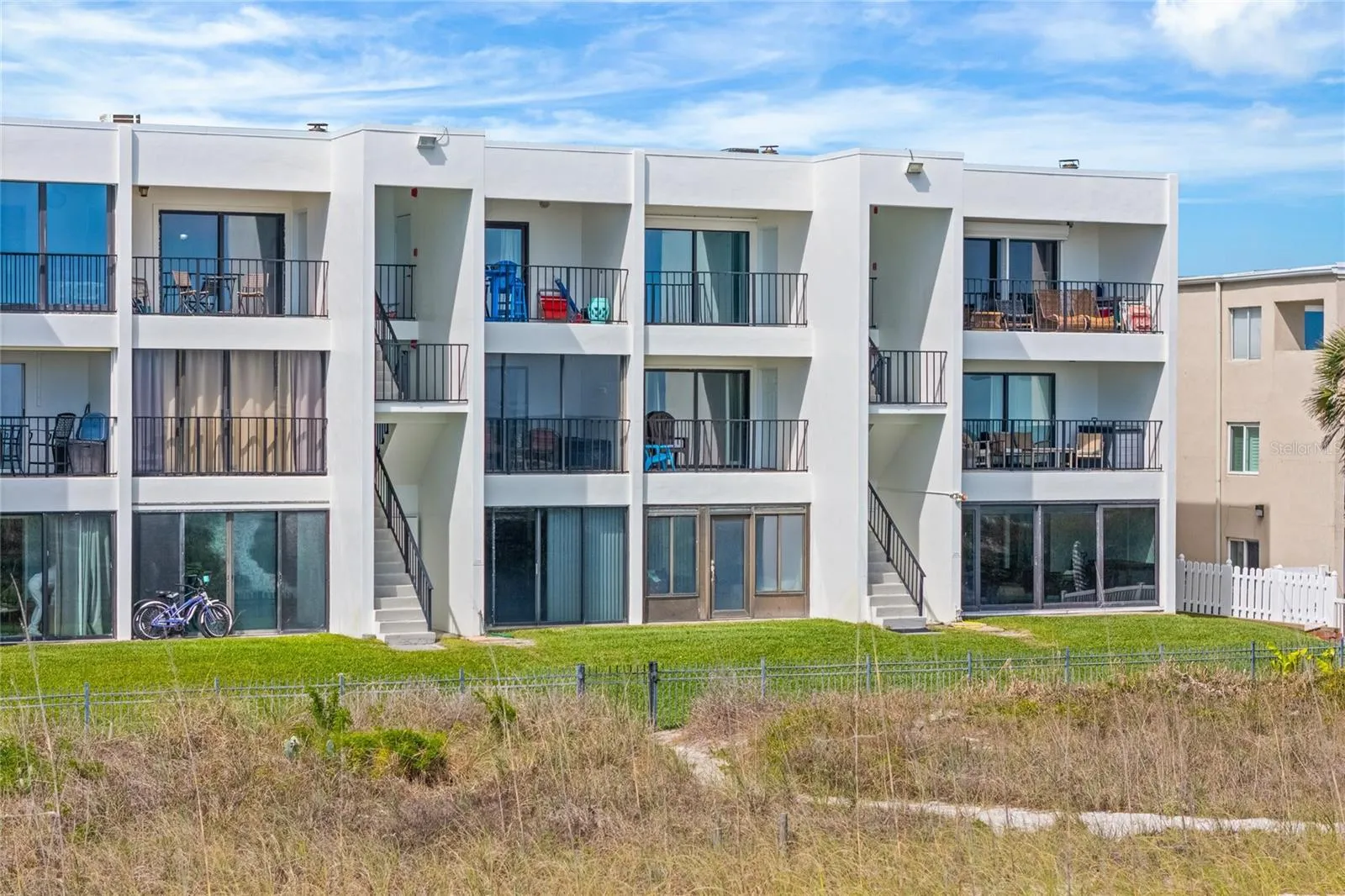 Direct beach access allows for effortless coastal living--morning walks on the sand, ocean sunrises, and year-round enjoyment.