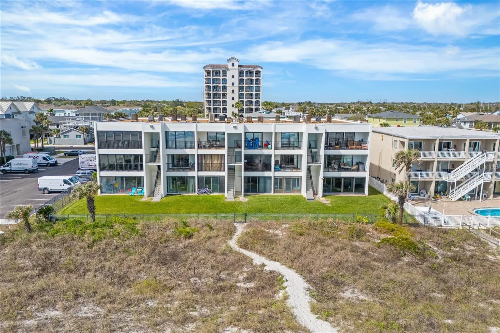Direct beach access allows for effortless coastal living--morning walks on the sand, ocean sunrises, and year-round enjoyment.