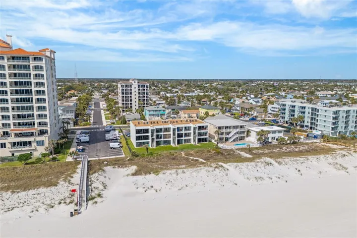 Direct beach access allows for effortless coastal living--morning walks on the sand, ocean sunrises, and year-round enjoyment.