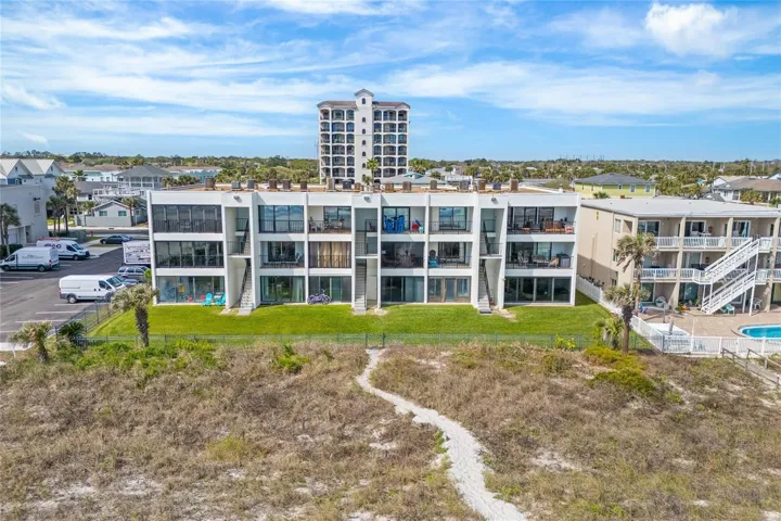 Direct beach access allows for effortless coastal living--morning walks on the sand, ocean sunrises, and year-round enjoyment.