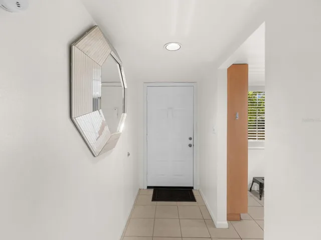Foyer entry and kitchen on the right