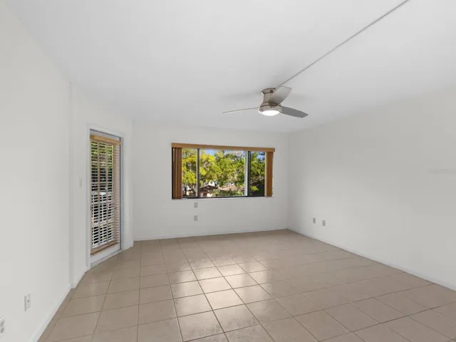Primary bedroom with access to patio and spectacular pool view!