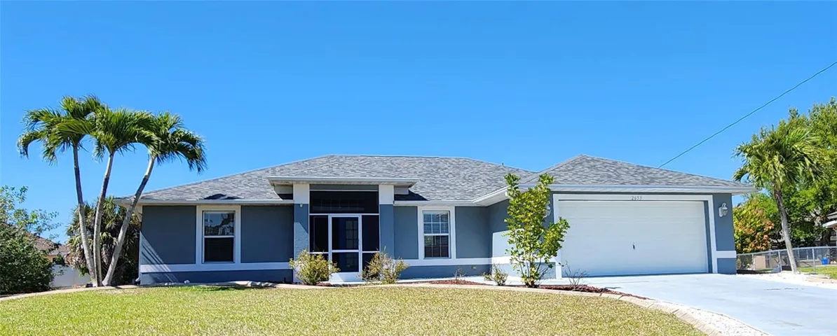 Front of home with Covered and Screened Lanai