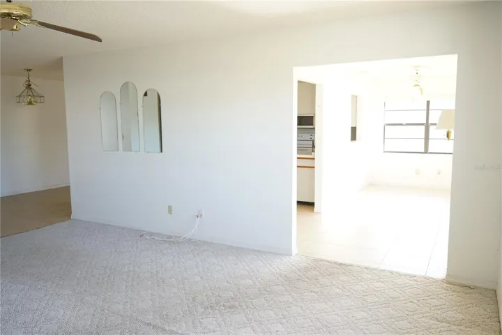 living room with doorway to bonus area
