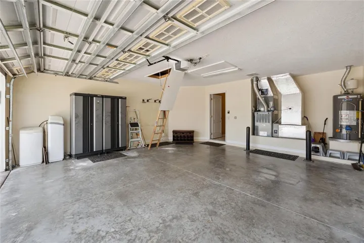 Garage with stairs to attic