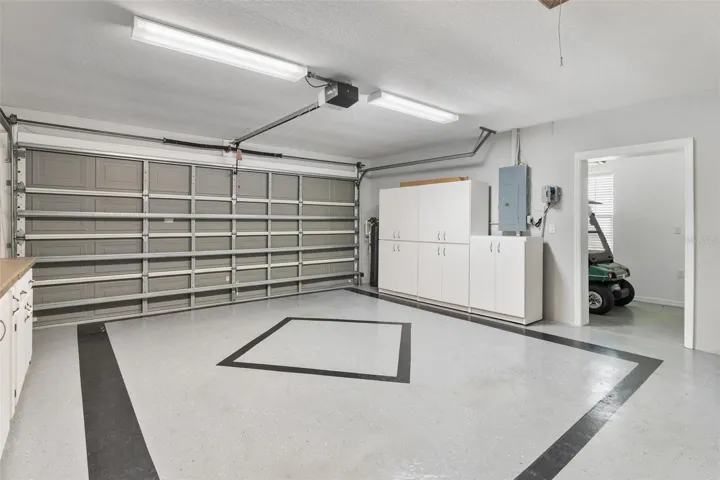 2 car garage features epoxy flooring