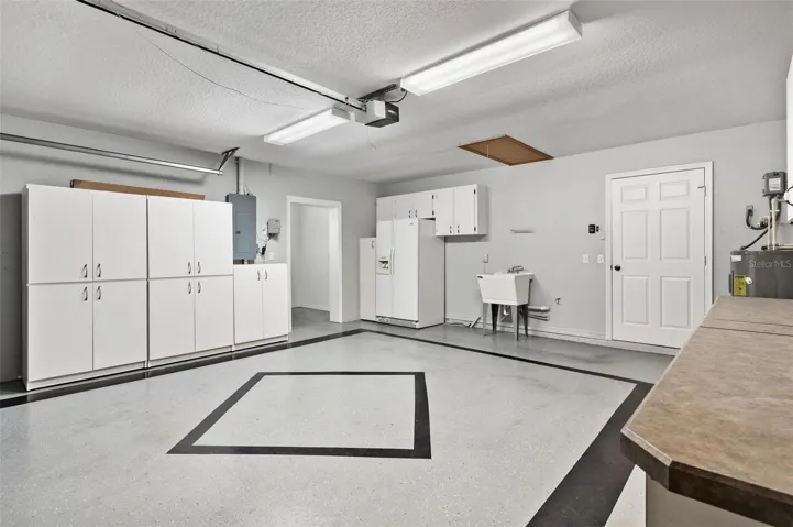 2 car garage features epoxy flooring