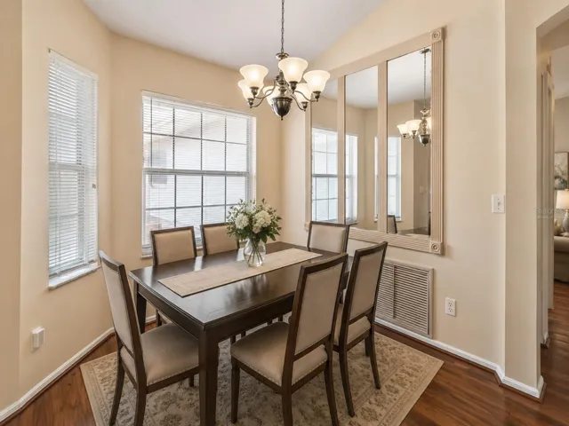 Virtually Staged-Formal Dining Area overlooks Living Room.