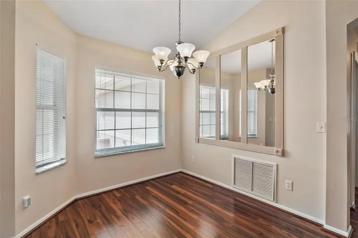 Formal Dining Area overlooks Living Room.