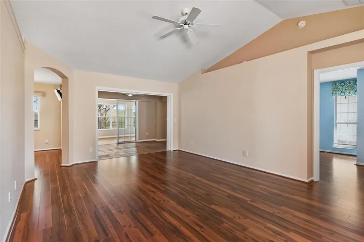 Interior entry greets you with high ceilings, engineered wood flooring overlooking the dining andliving rooms
