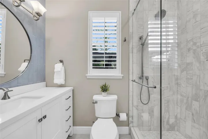 Fully renovated ensuite bath with separate shower.
