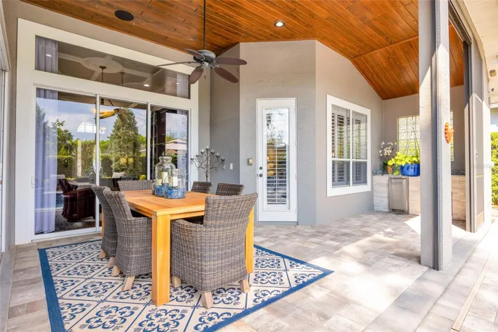 Lanai showing slider doors into living room and Primary bedroom
