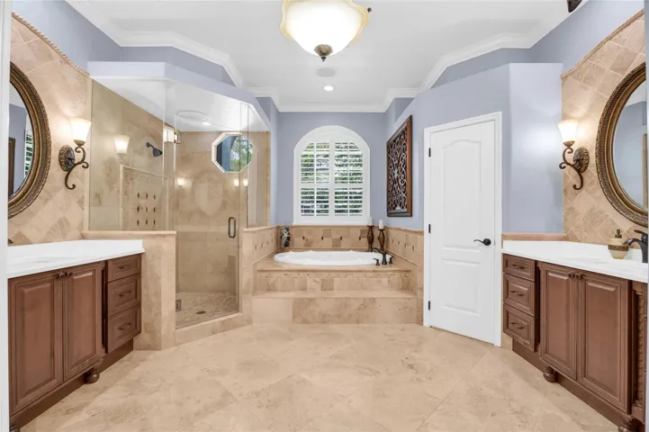 Primary bathroom with dual vanities