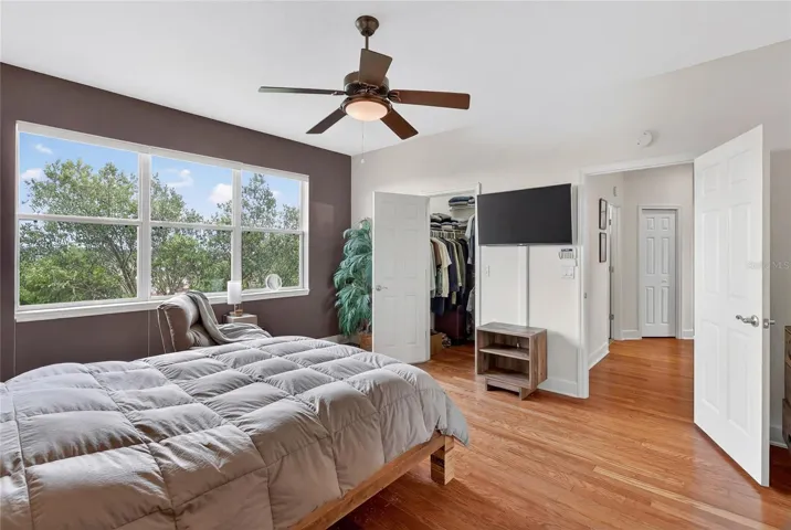 Primary bedroom walk in closet