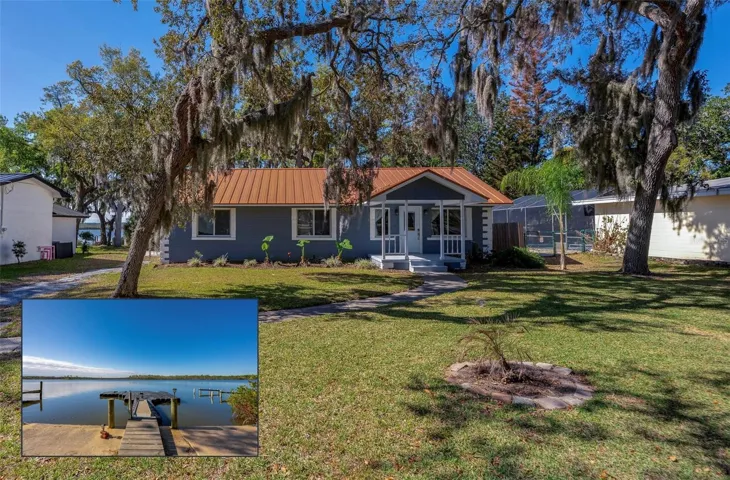 Charming single-story waterfront home with a metal roof, welcoming front porch, and mature shade trees that create a picturesque setting. The inset photo highlights the private dock and peaceful water views.