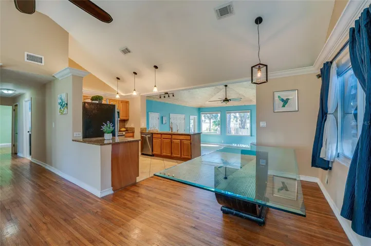 Dining area positioned beside the kitchen for easy everyday living and entertaining. The open design keeps the space connected and functional.