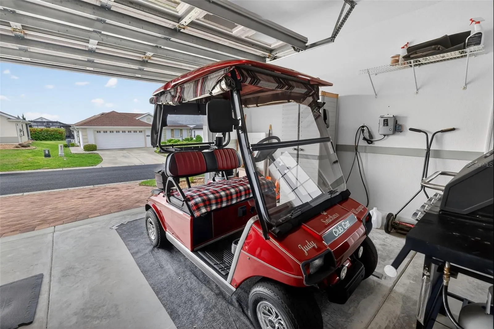 This is the golf cart that comes with the house and fits nicely in the oversized garage!