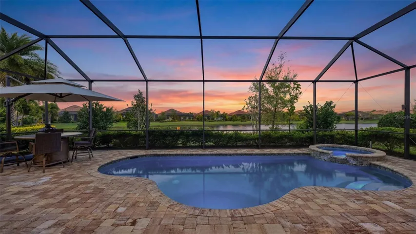 Heated pool and spa with peaceful lake setting