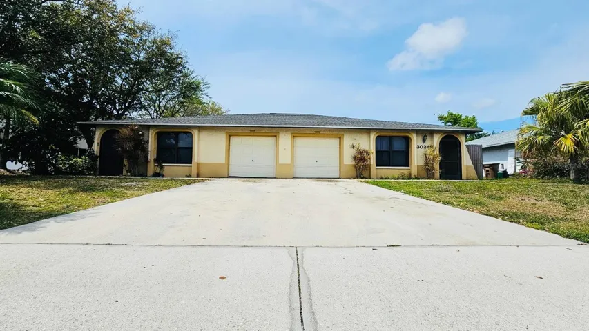 Spacious duplex with great potential in a desirable location.