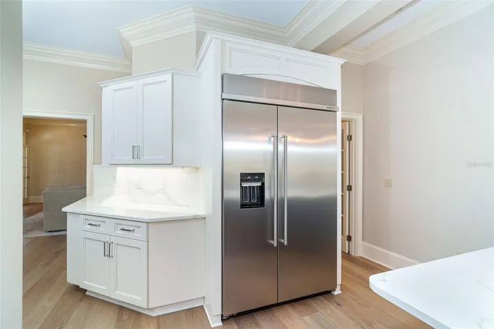 Stainless appliances, breakfast nook and wine refrigerator