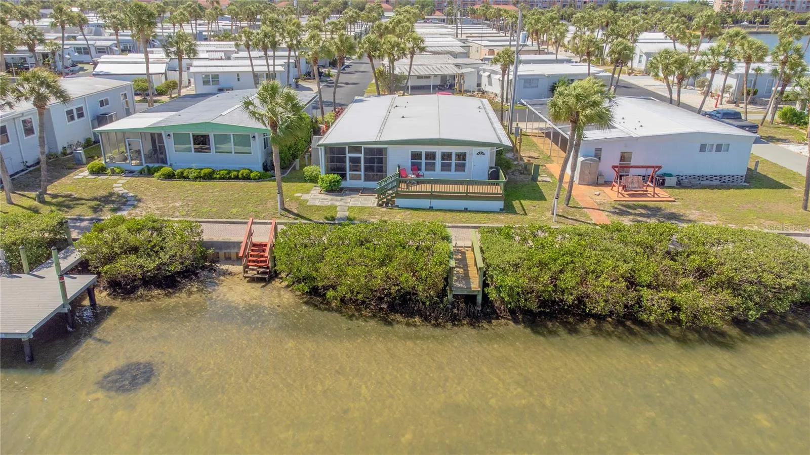 Rear of home with observation dock.