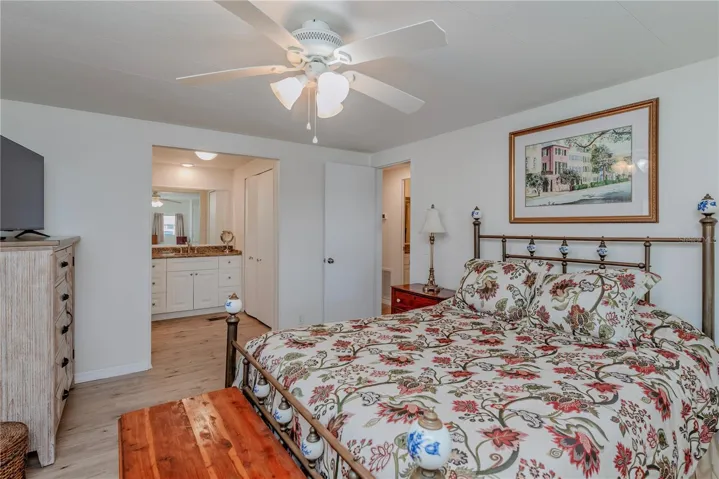 Primary bedroom with ensuite bath and walk-in closet.
