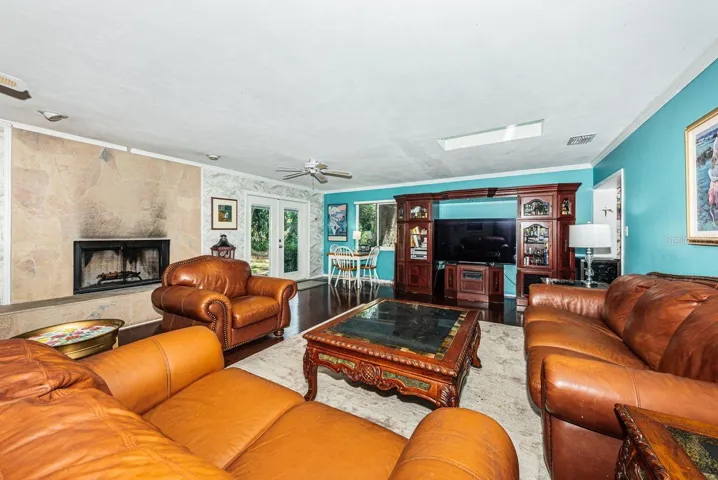 Huge Family room adjacent to pool area with French Doors