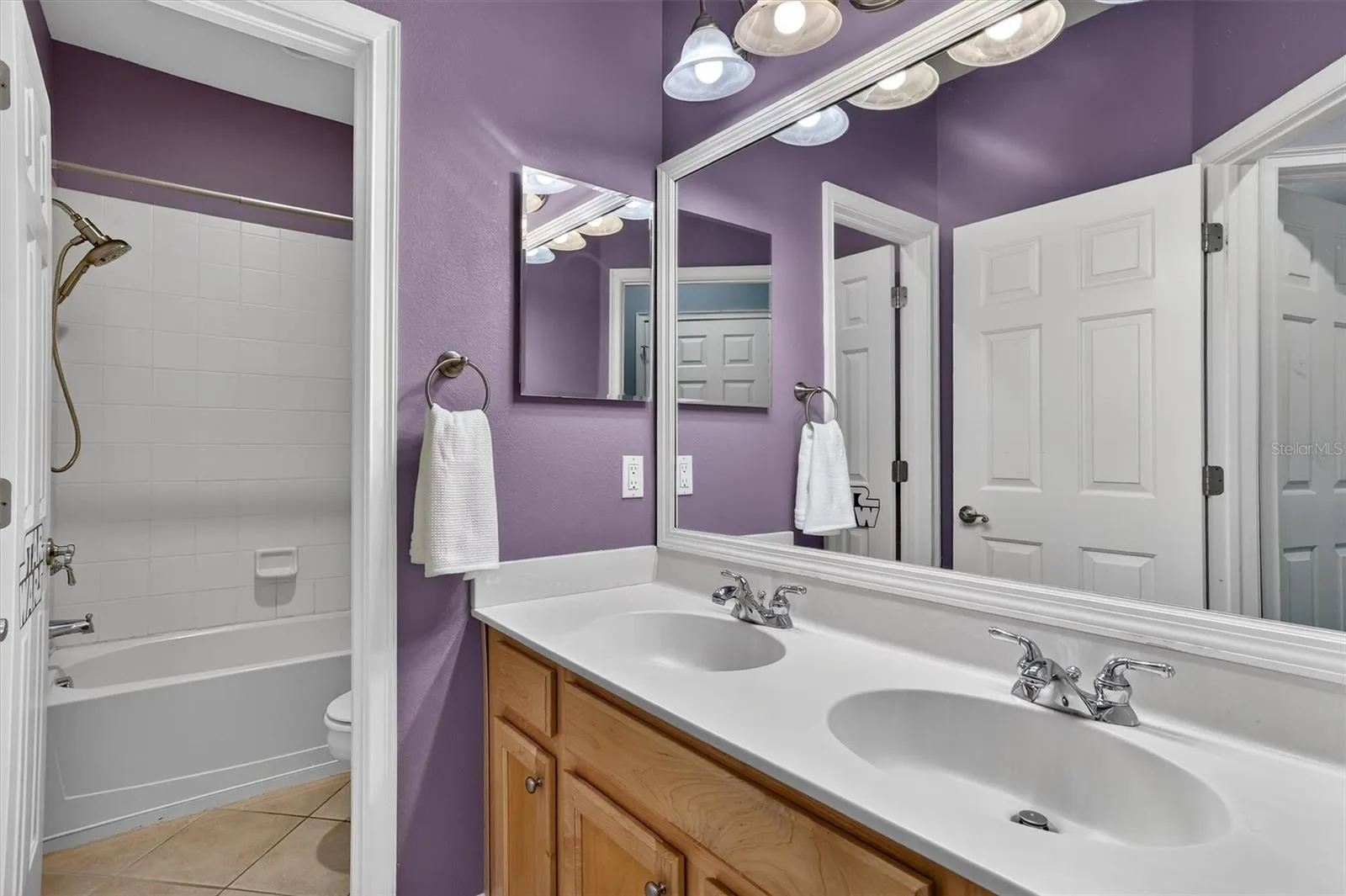 Guest bathroom on second story conveniently located for the guest bedrooms to share.