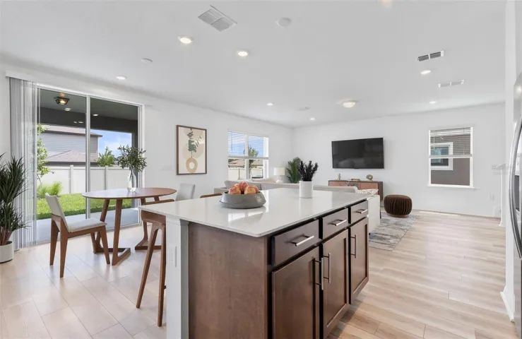 Virtually Staged - Open Kitchen to Cafe to Gathering Room
