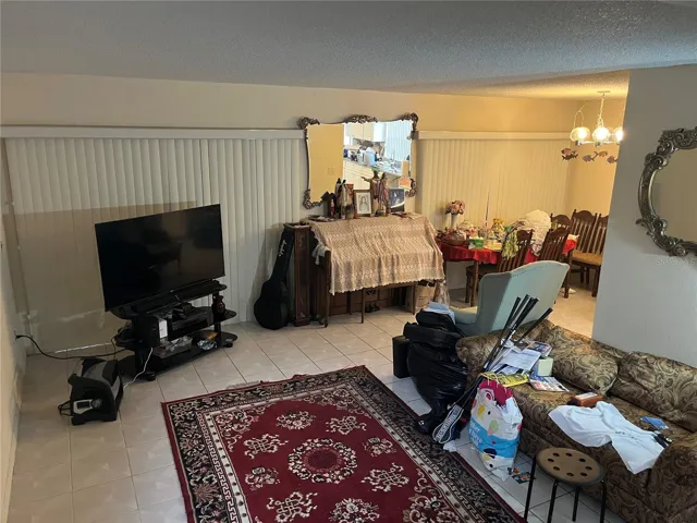 Main living area offers a functional footprint but will require cosmetic renovation—strong opportunity to modernize and add value in Winter Park 32792.