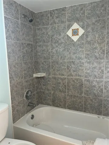 Bathrooms ready for a full refresh—offering the opportunity to design clean, modern spaces that elevate overall value.