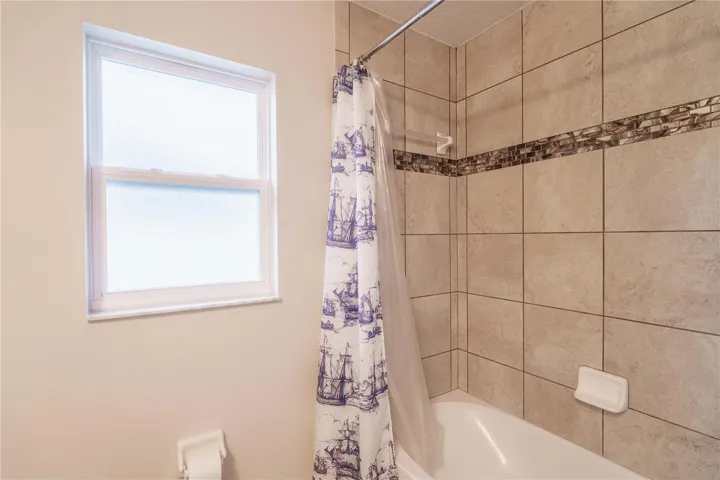 Guest bath tiled shower