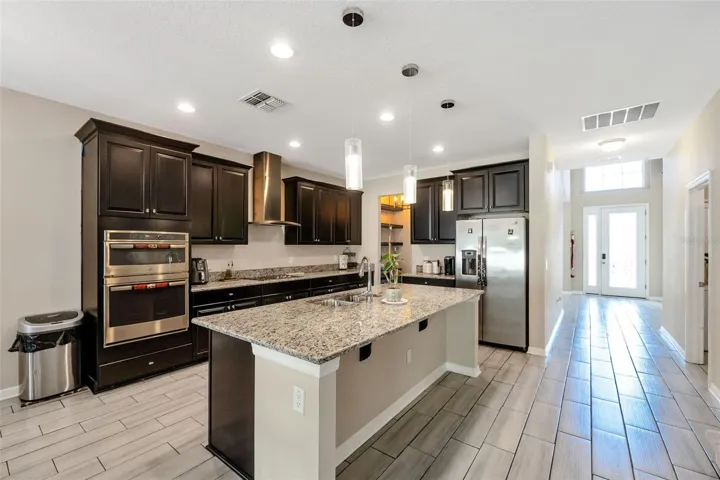 Kitchen with view of entry