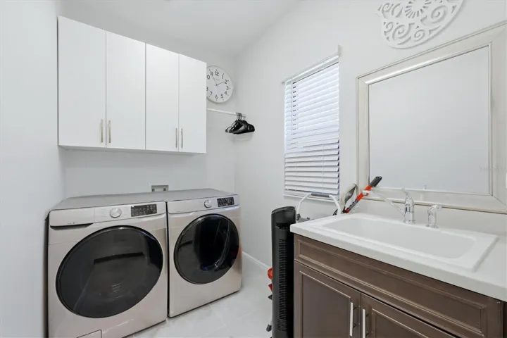 laundry room with custom cabinetry