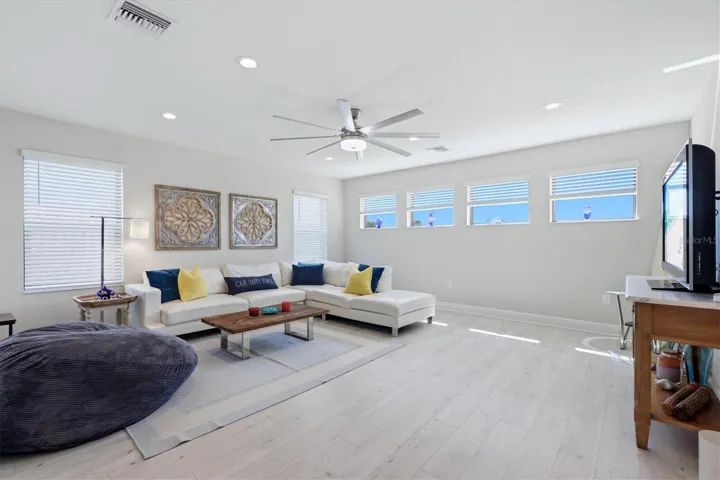 upstairs living room is spacious and bright